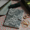 wrapping your christmas presents in beautiful sustainable wrapping paper