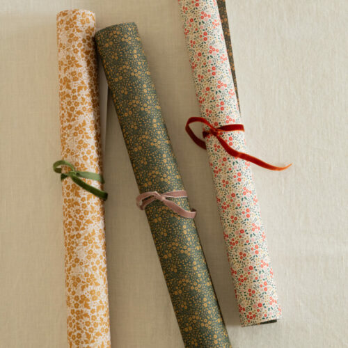 little stars and flowers double sided christmas gift wrap and secret garden gift wrap with text