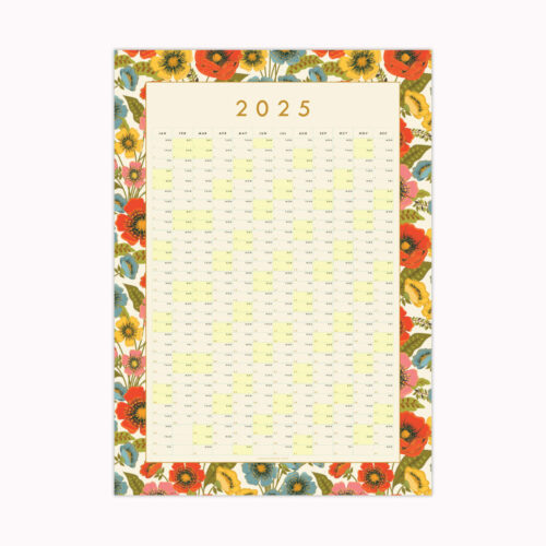 a cut out shot of a 2025 bright floral year planner in red, blue, yellow and pink flowers