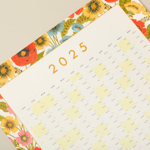 a close up image of a floral 2025 year planner