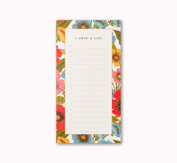 cut out image of the garden bloom floral list notepad, showing the lined pages, checkboxes and beautiful brightly coloured hand drawn floral border. Perfect stocking filler or secret santa gift for flower lovers under £10