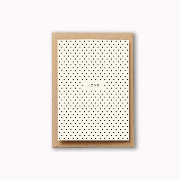 ecru background with black polka dot spots covering front of card with the word love in the middle of the dots