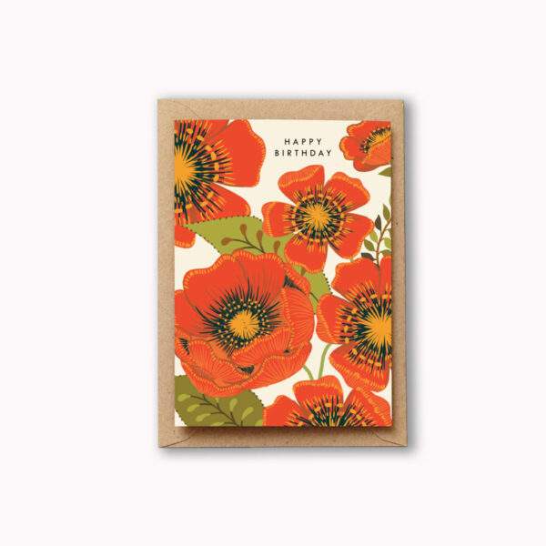 Happy Birthday Red Bloom Card Birthday card with large bright tomatoey red poppy flowers over the front and the words Happy Birthday at the top of the card